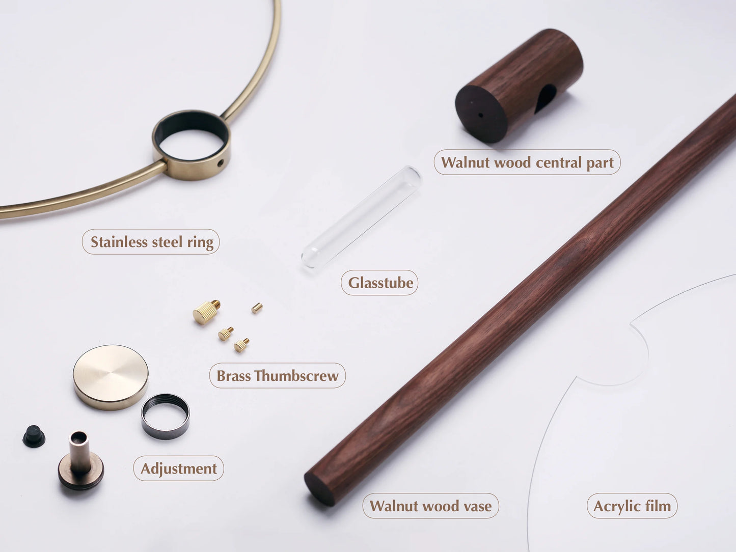 Exploded view of the Japandi wall vase components, including walnut and brass.