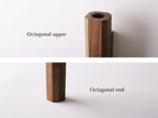 Detail shots showing the octagonal shape of the walnut wall vase.