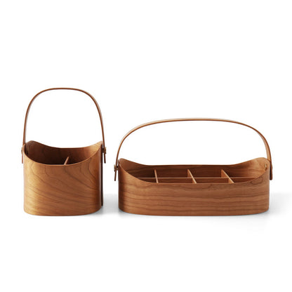 Side-by-side view of two sizes of cherry wood bentwood caddies.