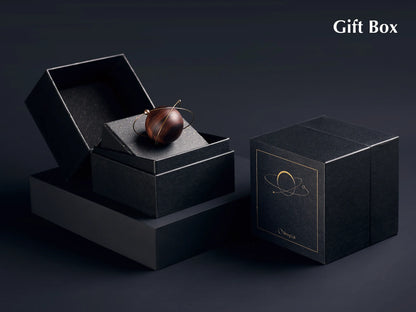 A luxury car scent diffuser in a black gift box with gold lettering.