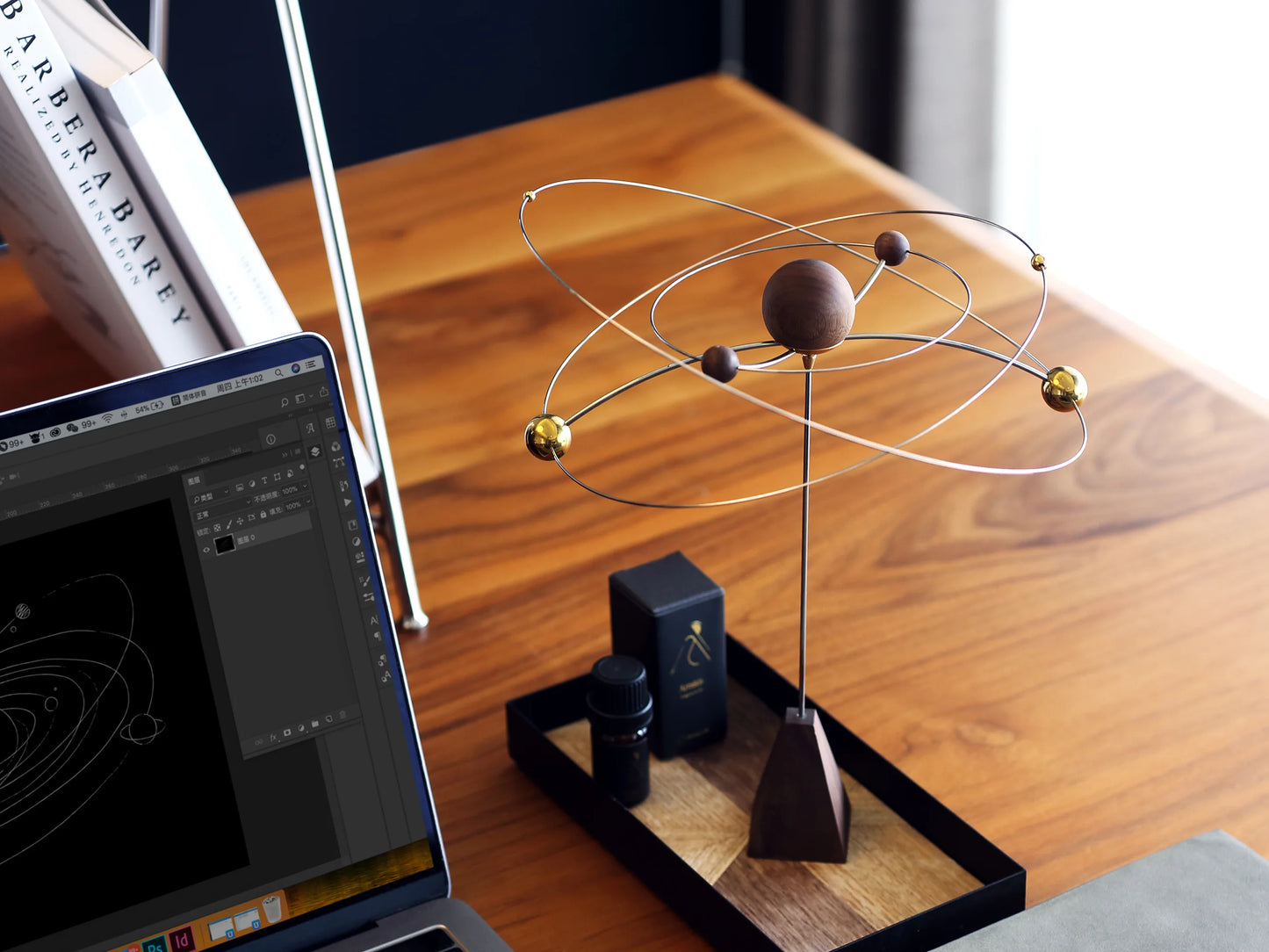 An alternate version of the galaxy diffuser with a black walnut wood base.