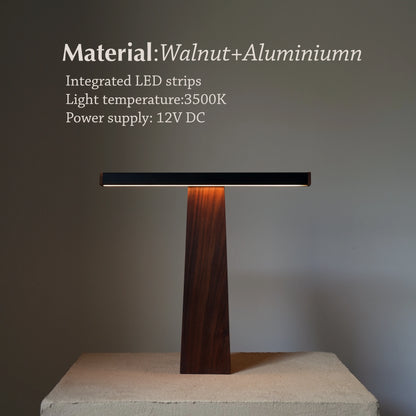 Full-frontal view of walnut and aluminum desk lamp with light temperature noted.