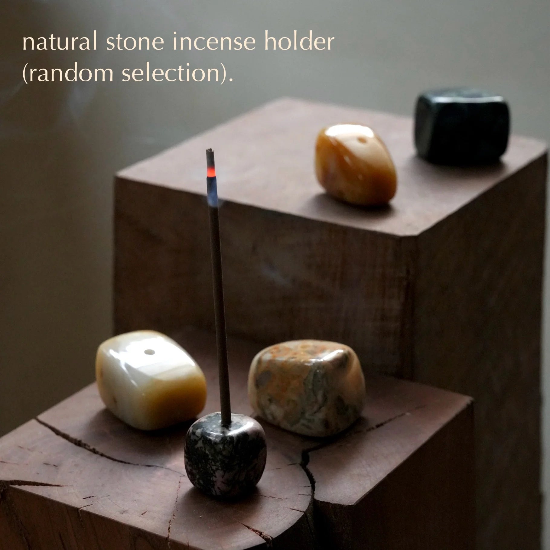 Five unique natural stone holders for burning stick incense.