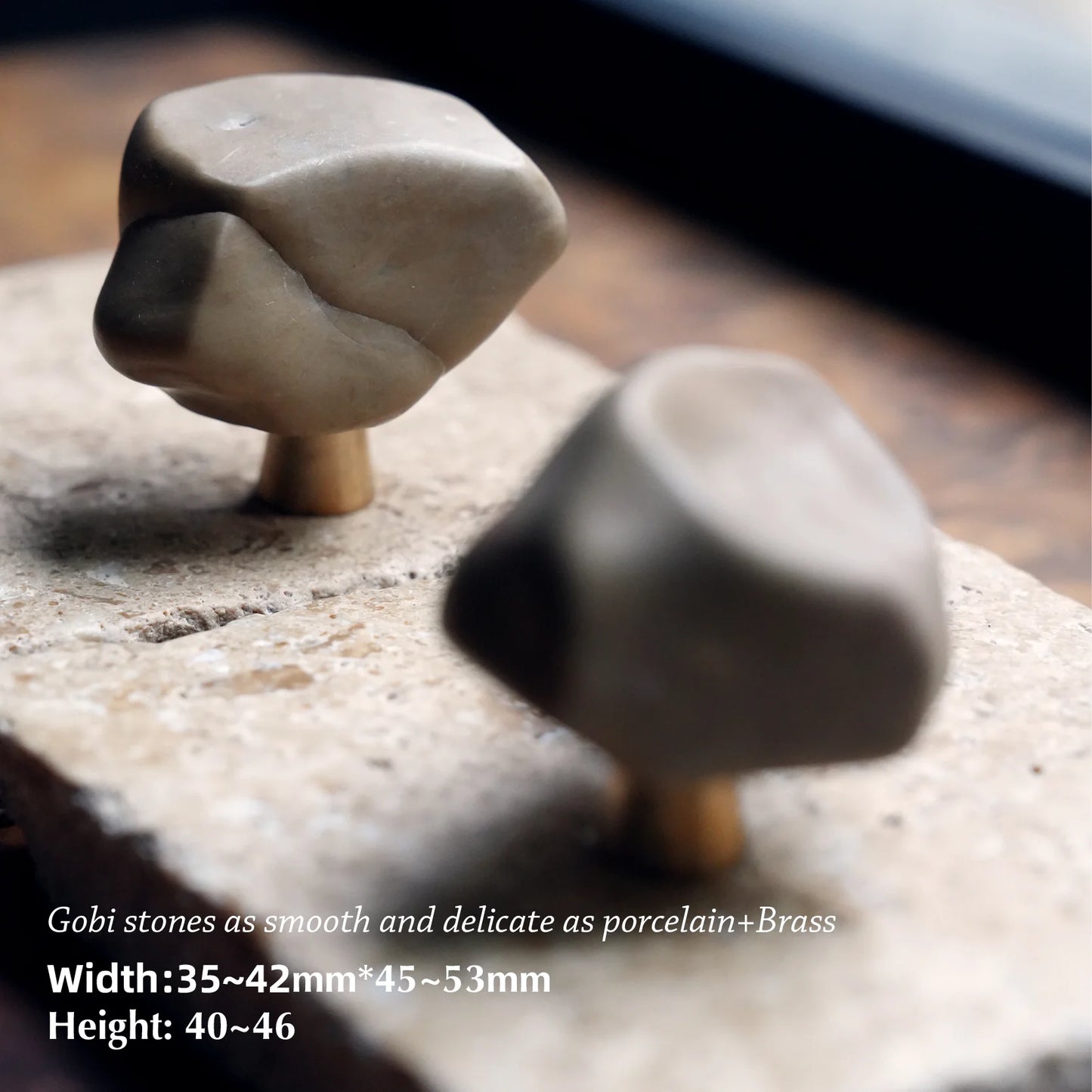 Image of two stone knobs with dimensions: 35-42mm width.