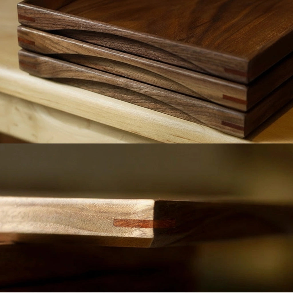 Stacked walnut and maple wood trays showing natural grain contrast