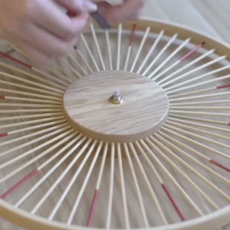 Installation video of a minimalist bamboo spoke clock.